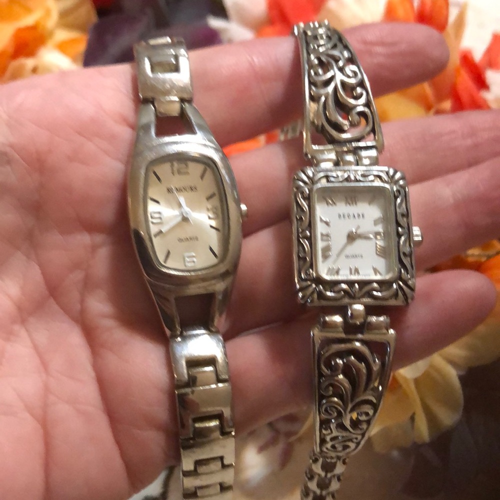 Two silver watches